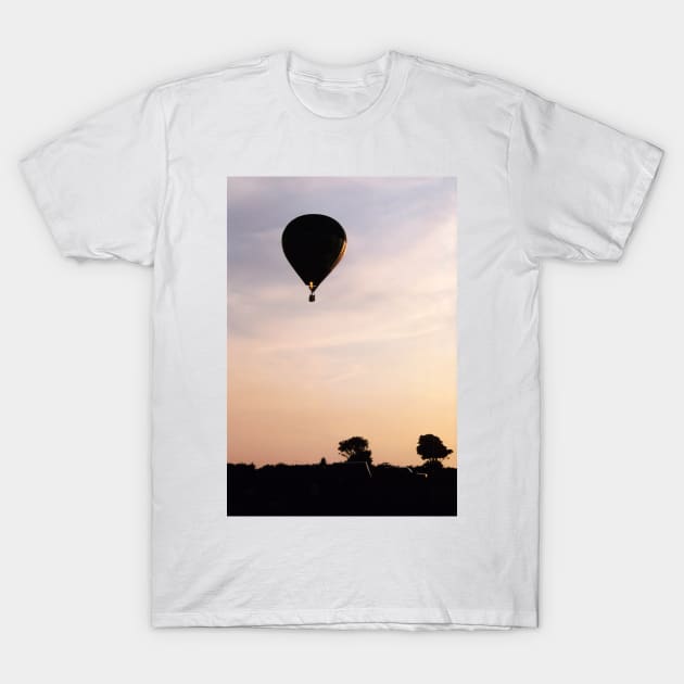 Hot Air Balloon flying during a summer evening T-Shirt by richflintphoto